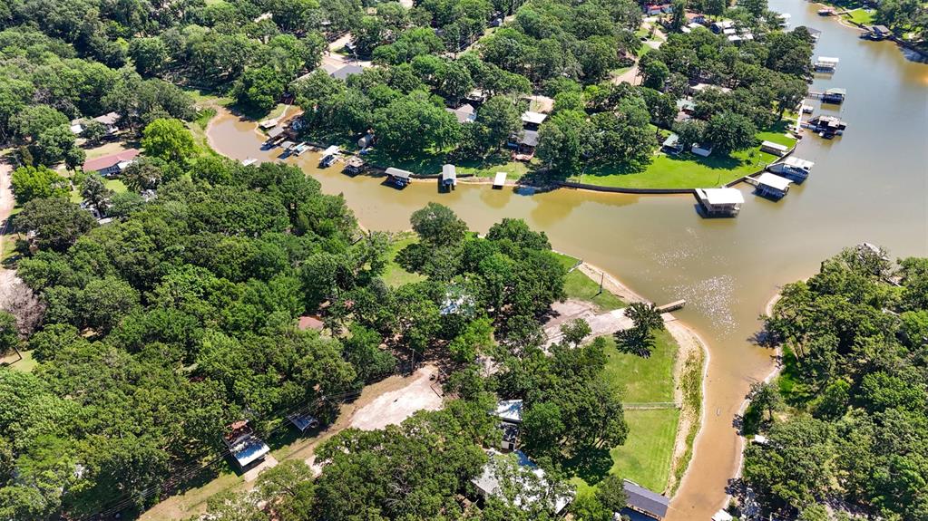 7110 Apache Circle Mabank, TX 75156 - Photo 36 of 40 an aerial view of residential houses with outdoor space and trees all around