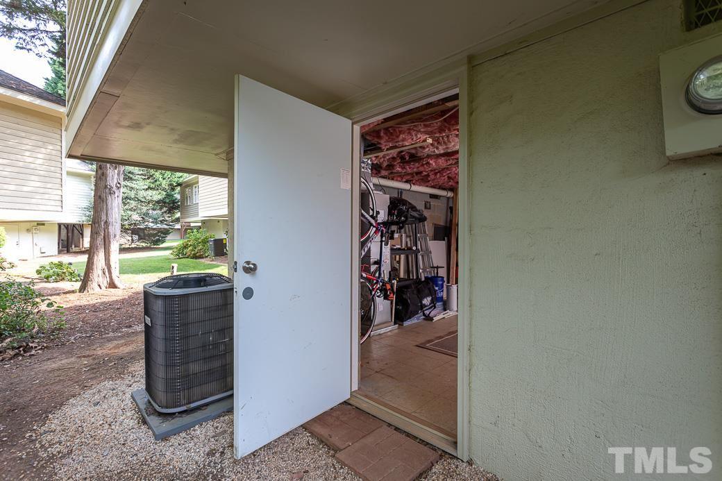 3306 Mill Run, Unit 3306 Raleigh, NC 27612 - Photo 22 of 24 a view of walk in closet with clothes and shoes