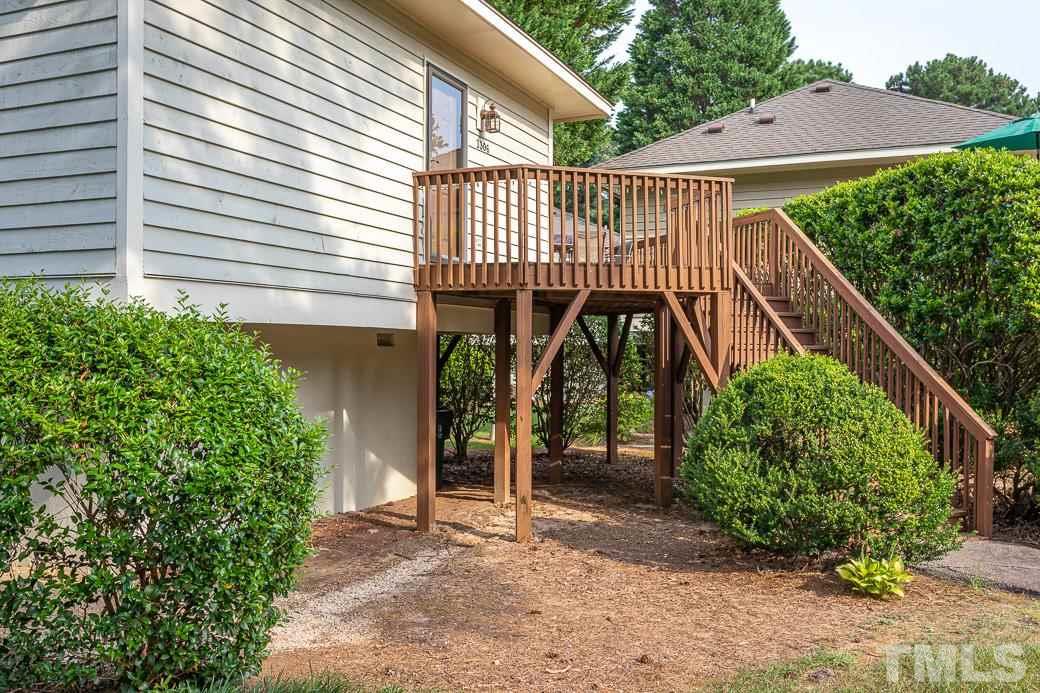 3306 Mill Run, Unit 3306 Raleigh, NC 27612 - Photo 6 of 24 a front view of a house with garden