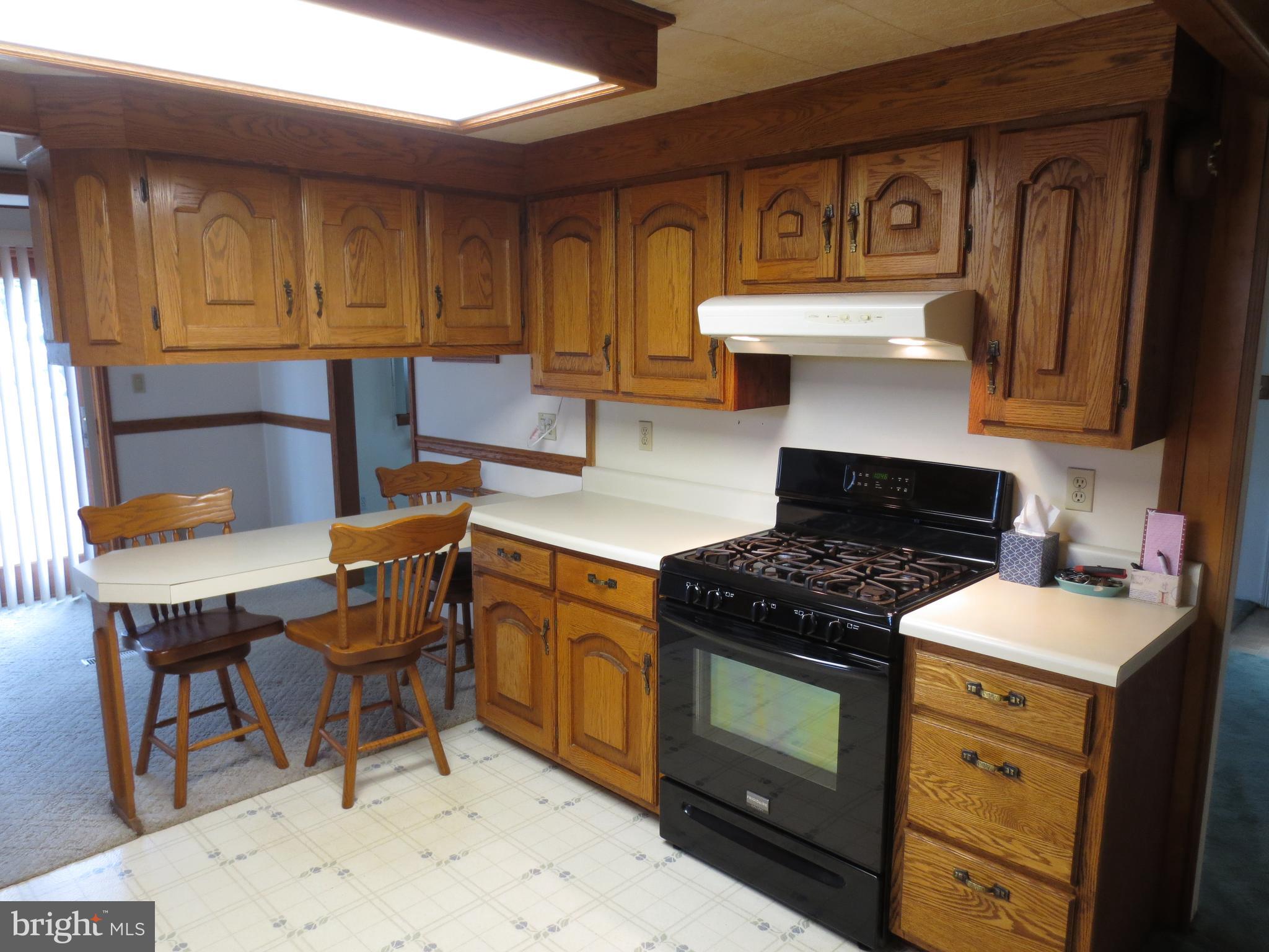 1998 Sheaffer Road Elizabethtown, PA 17022 - Photo 8 of 19 a kitchen with a stove a sink and cabinets