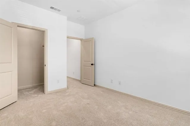 an empty room with an entryway