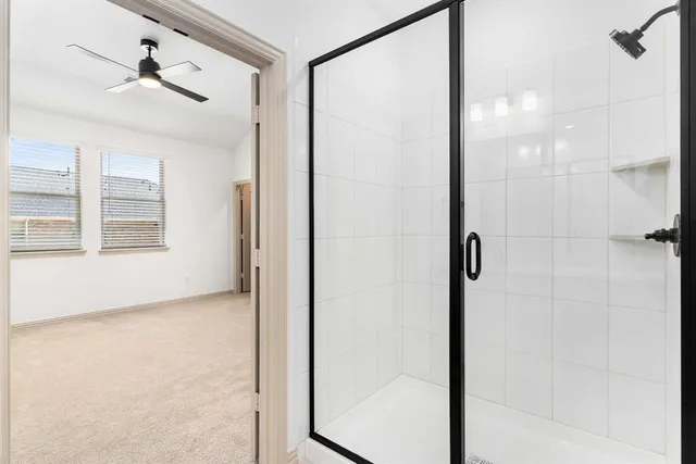 a view of a bathroom with a shower