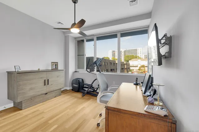 a bedroom with a bed and furniture