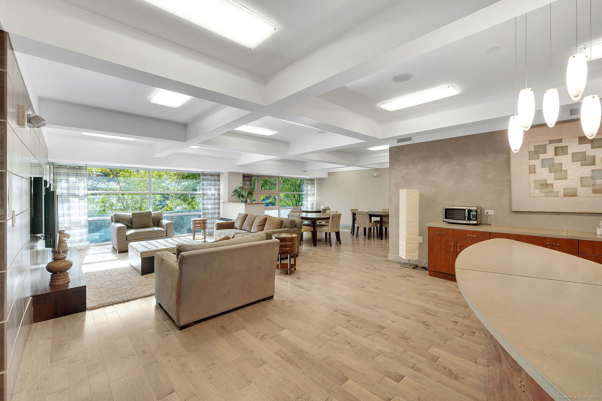 1515 Summer Street, Unit 302 Stamford, CT 06905 - Photo 24 of 33 a living room with furniture and a large window