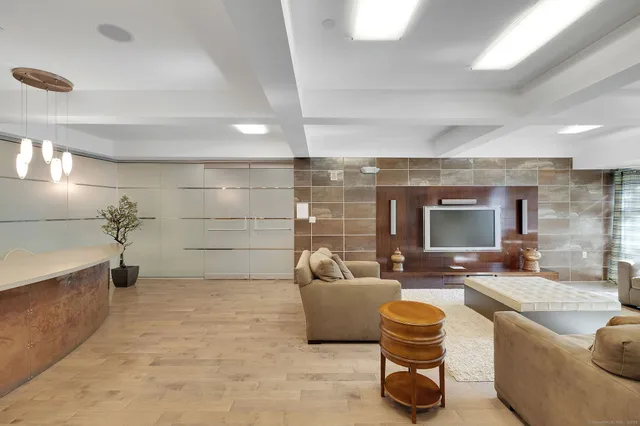 a view of an empty room with a balcony