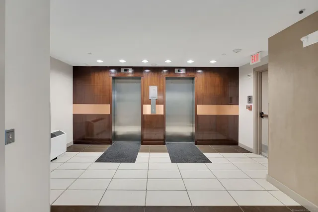 an aerial view of residential house and green space