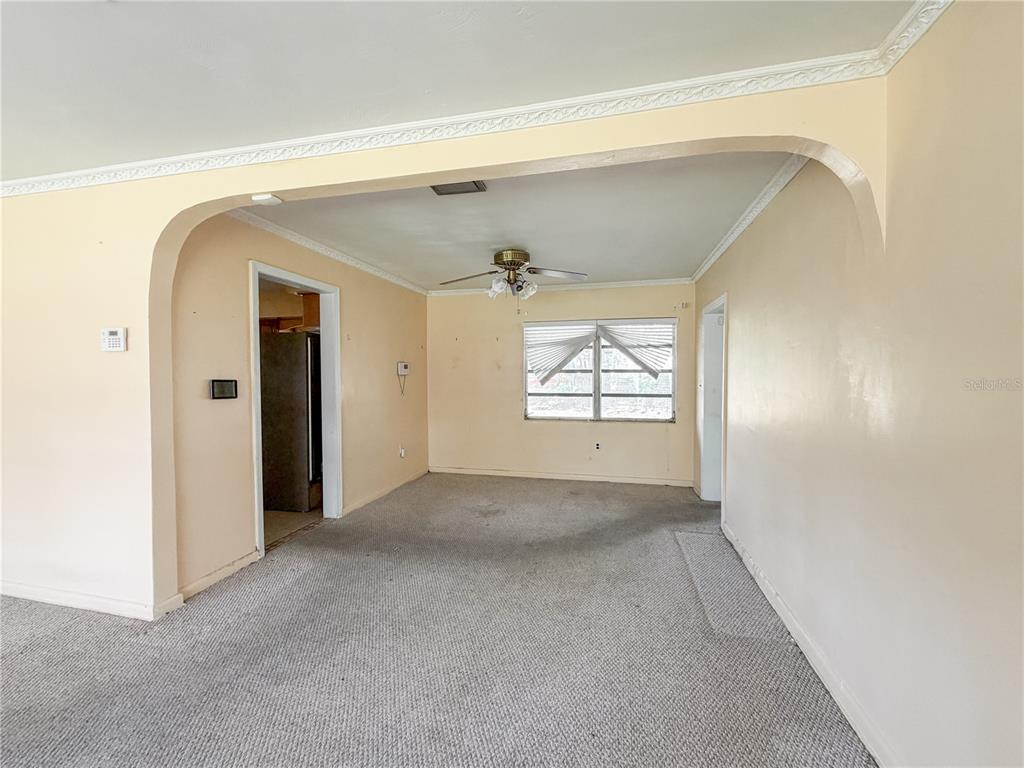615 North Church Street Starke, FL 32091 - Photo 19 of 44 an empty room with windows and closet