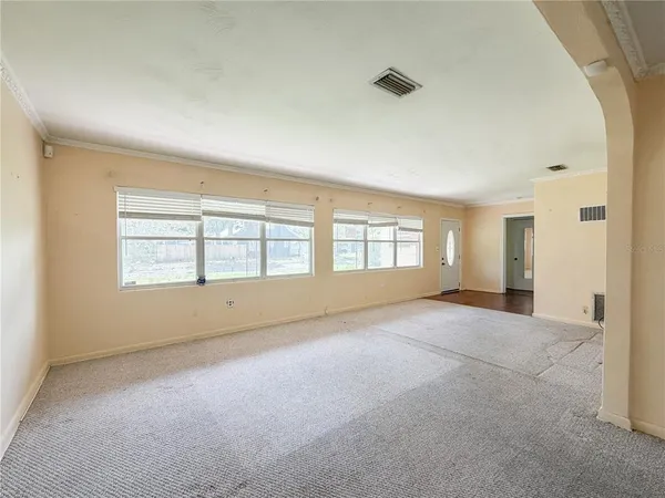 an empty room with windows