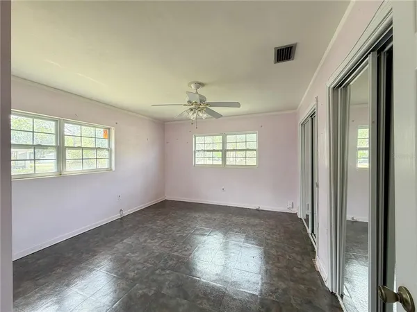 an empty room that has a window
