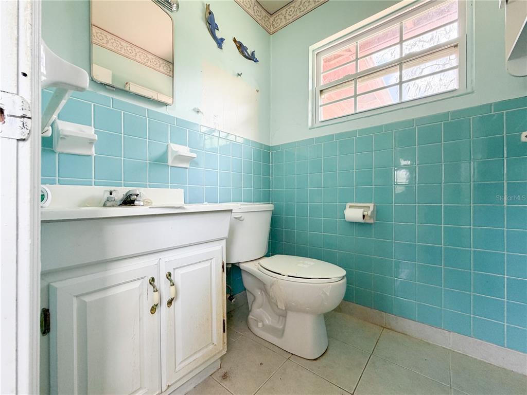 615 North Church Street Starke, FL 32091 - Photo 30 of 44 a bathroom with a sink toilet and shower