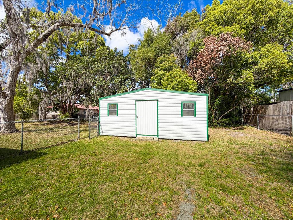 615 North Church Street Starke, FL 32091 - Photo 10 of 44 a view of a house with a yard