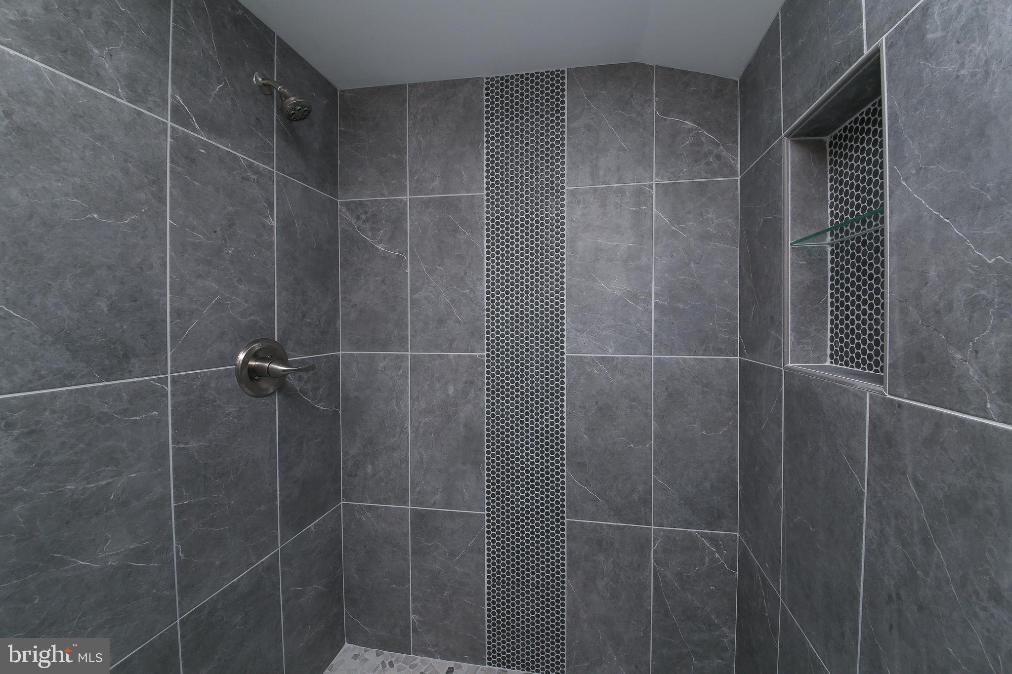 986 Coronet Road Warminster, PA 18974 - Photo 11 of 17 a bathroom with a shower