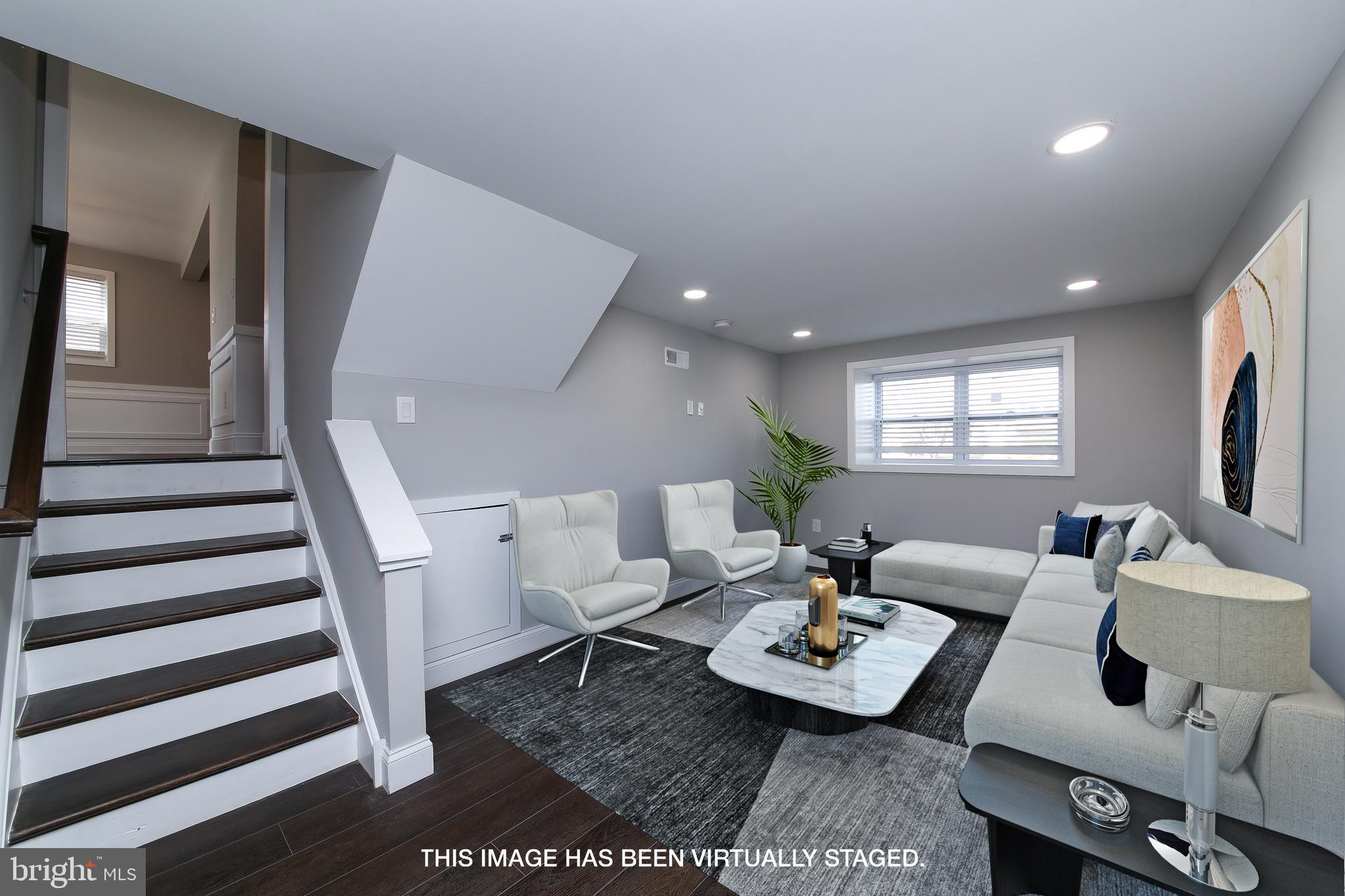 986 Coronet Road Warminster, PA 18974 - Photo 12 of 17 a living room with furniture and wooden floor