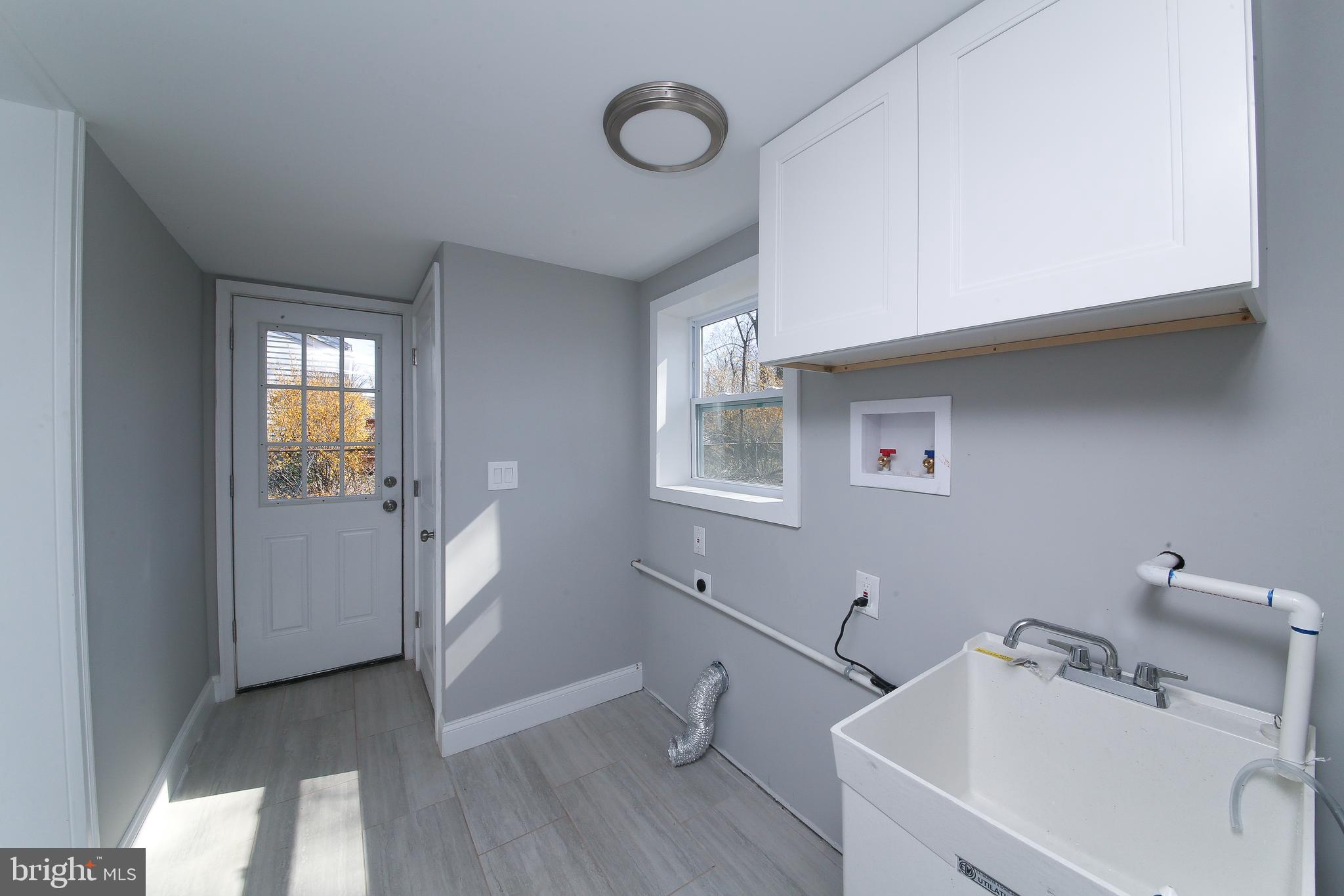 986 Coronet Road Warminster, PA 18974 - Photo 15 of 17 a bathroom with a sink and mirror