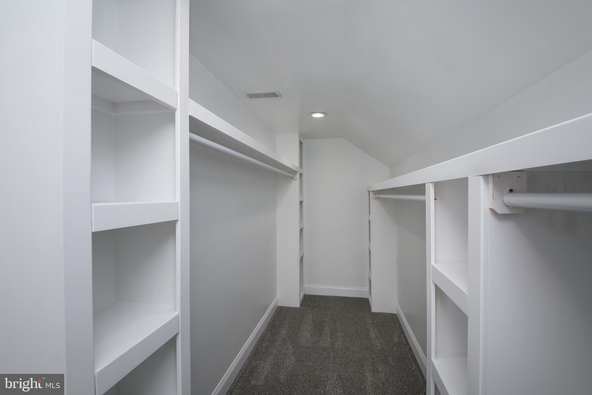 986 Coronet Road Warminster, PA 18974 - Photo 9 of 17 a view of walk in closet with empty racks