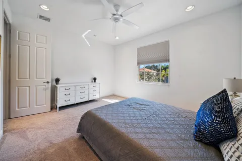 a view of a room with storage and racks on the wall