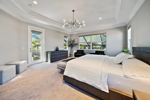 a view of swimming pool with seating area