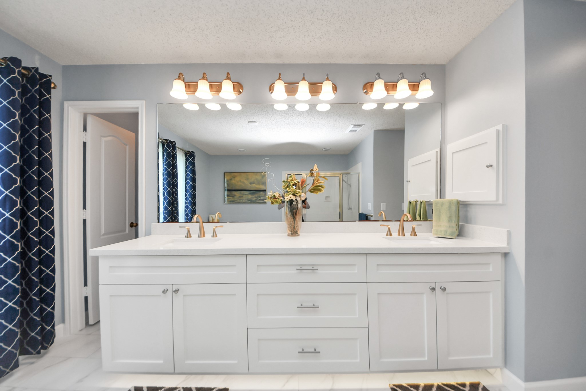 3107 Dulaney Road Houston, TX 77084 - Photo 24 of 50 a bathroom with a sink vanity and a mirror