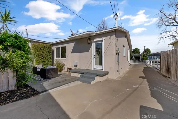 a room with a door and windows