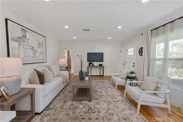 a living room with furniture and a couch