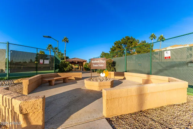 a view of a swimming pool with a patio