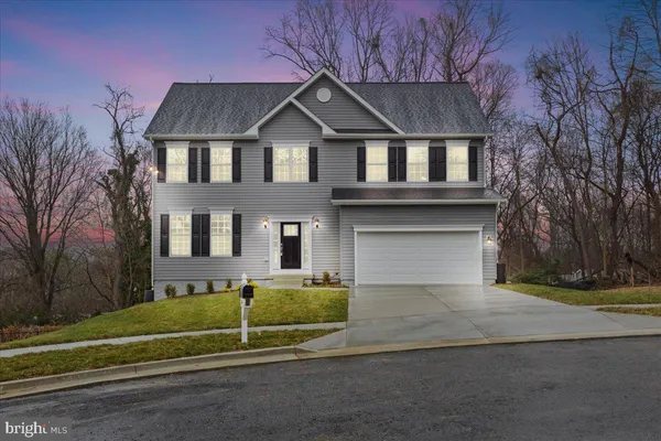 a house view with a garden space