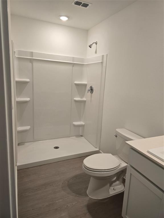 1165 Barbary Flds Street Forney, TX 75126 - Photo 15 of 24 a white toilet sitting next to a bath tub