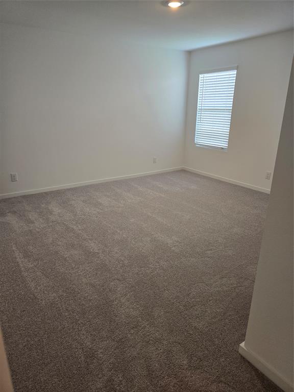 1165 Barbary Flds Street Forney, TX 75126 - Photo 16 of 24 an empty room with a window
