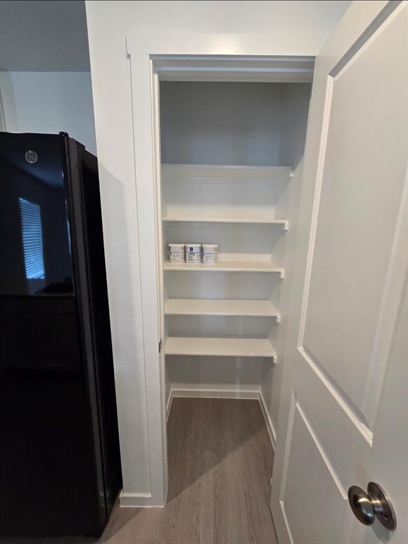 1165 Barbary Flds Street Forney, TX 75126 - Photo 18 of 24 a view of walk in closet with empty racks