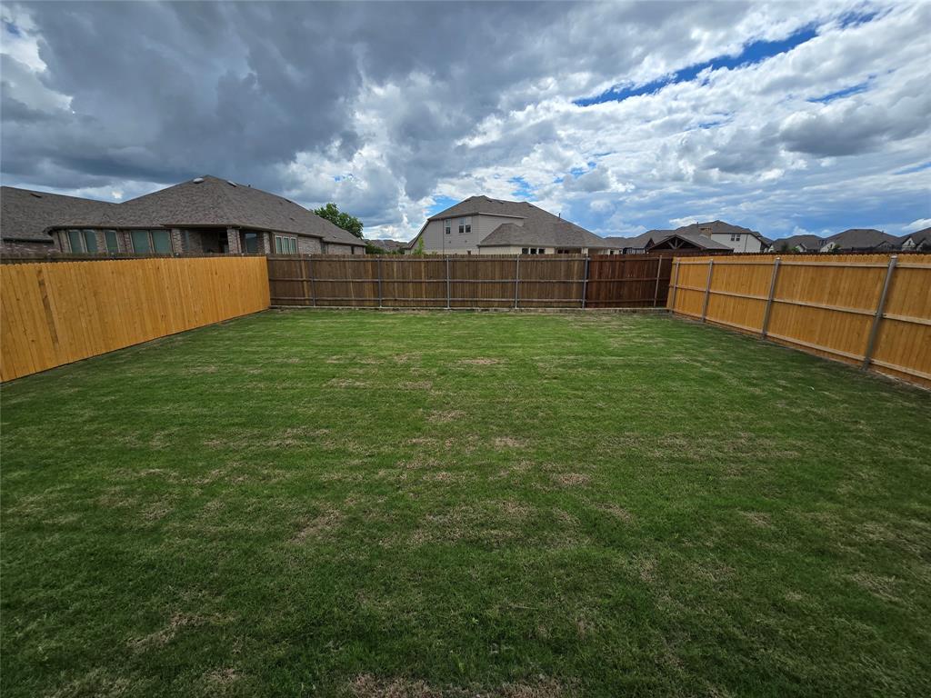 1165 Barbary Flds Street Forney, TX 75126 - Photo 3 of 24 a view of a backyard