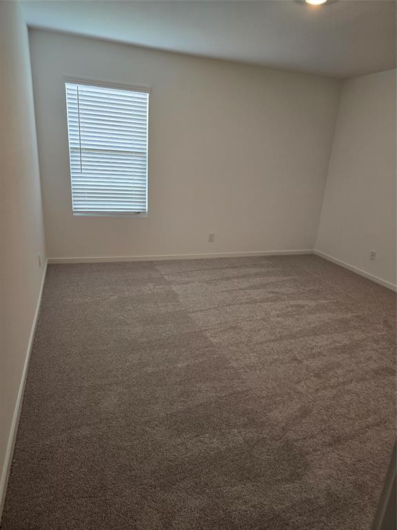 1165 Barbary Flds Street Forney, TX 75126 - Photo 4 of 24 a view of a room that has a window in it