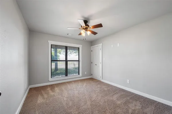 wooden floor in an empty room and a window