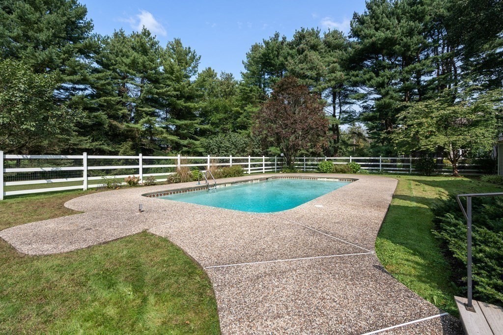 55 Westerly Road Weston, MA 02493 - Photo 26 of 30 a view of a swimming pool with a yard