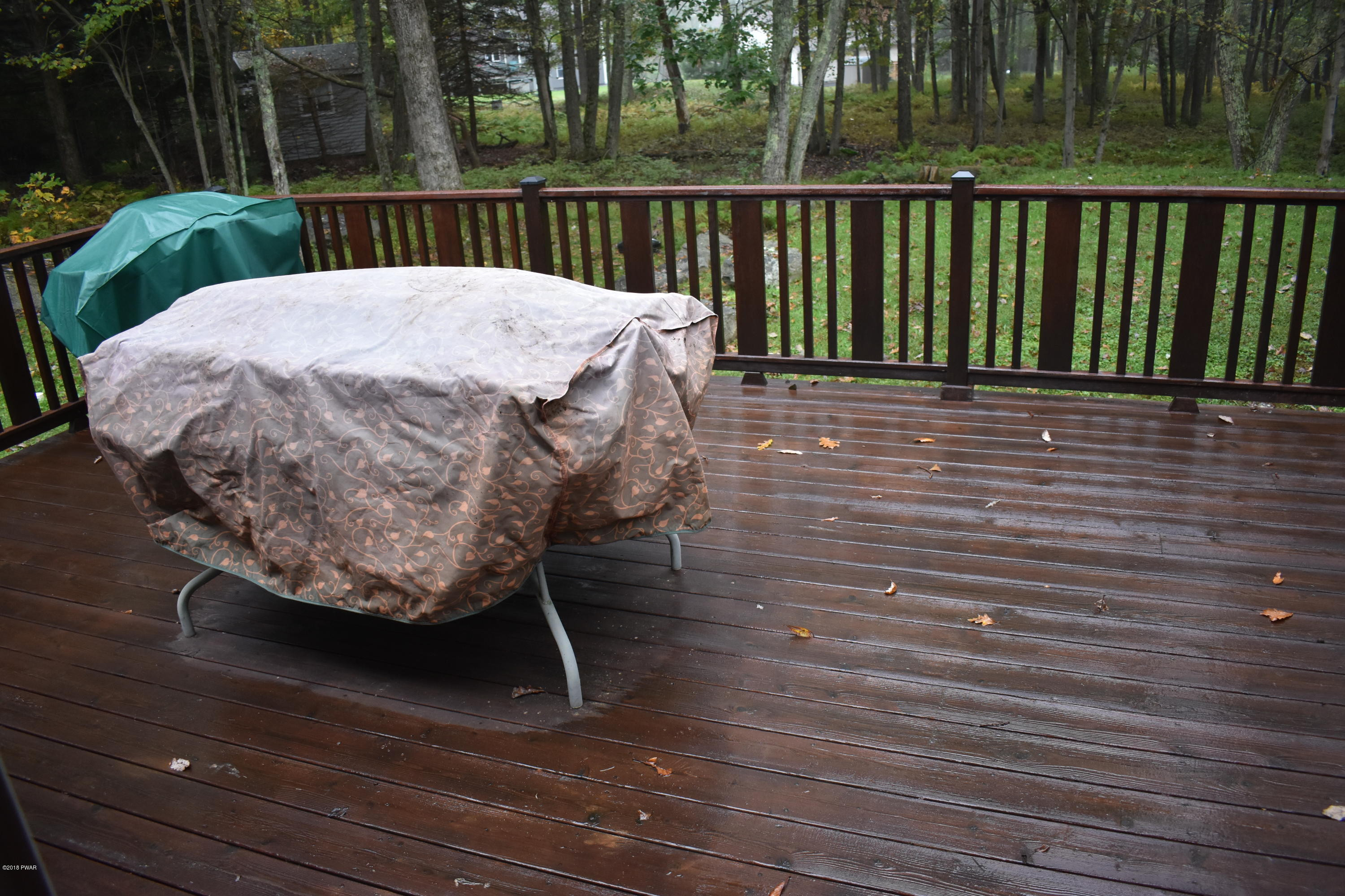114 Rodeo Drive Hawley, PA 18428 - Photo 17 of 41 a view of balcony with wooden floor
