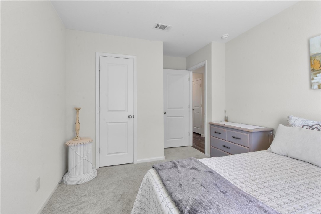 2424 Granite Road Bullhead City, AZ 86442 - Photo 17 of 50 Interior room featuring light-toned walls and plush carpeting