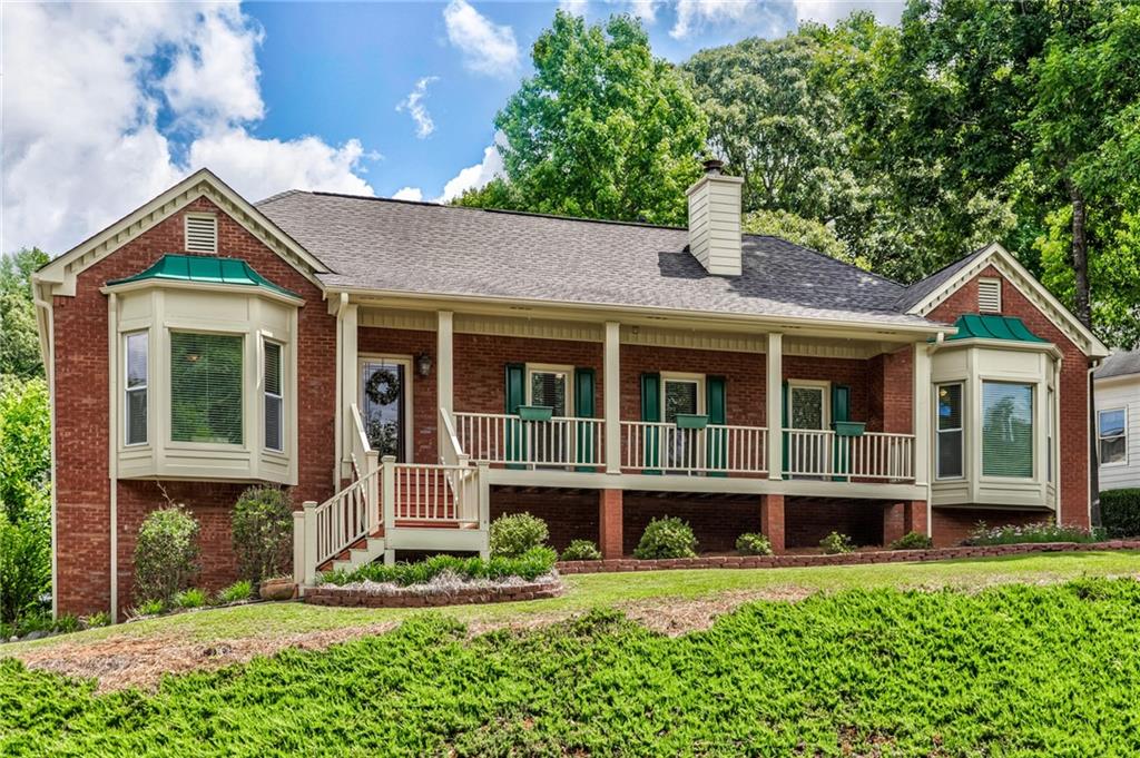 5002 Niagara Drive Acworth, GA 30102 - Photo 1 of 1 a front view of a house with a yard