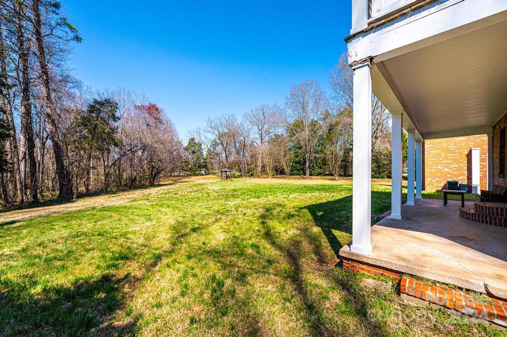 3878 Robinson Road Newton, NC 28658 - Photo 8 of 47 a view of swimming pool with an outdoor seating