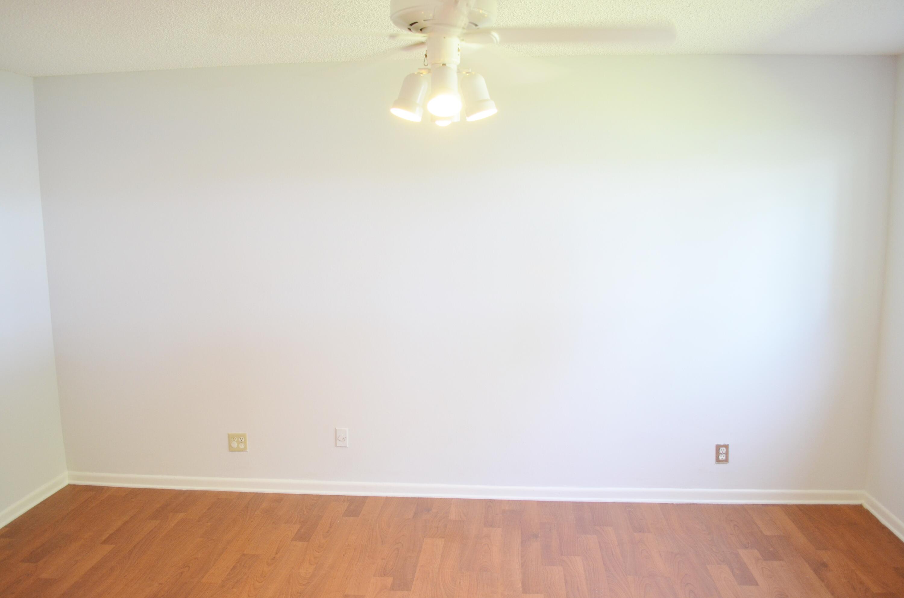 5220 Las Verdes Circle, Unit 211 Delray Beach, FL 33484 - Photo 14 of 57 a view of an empty room