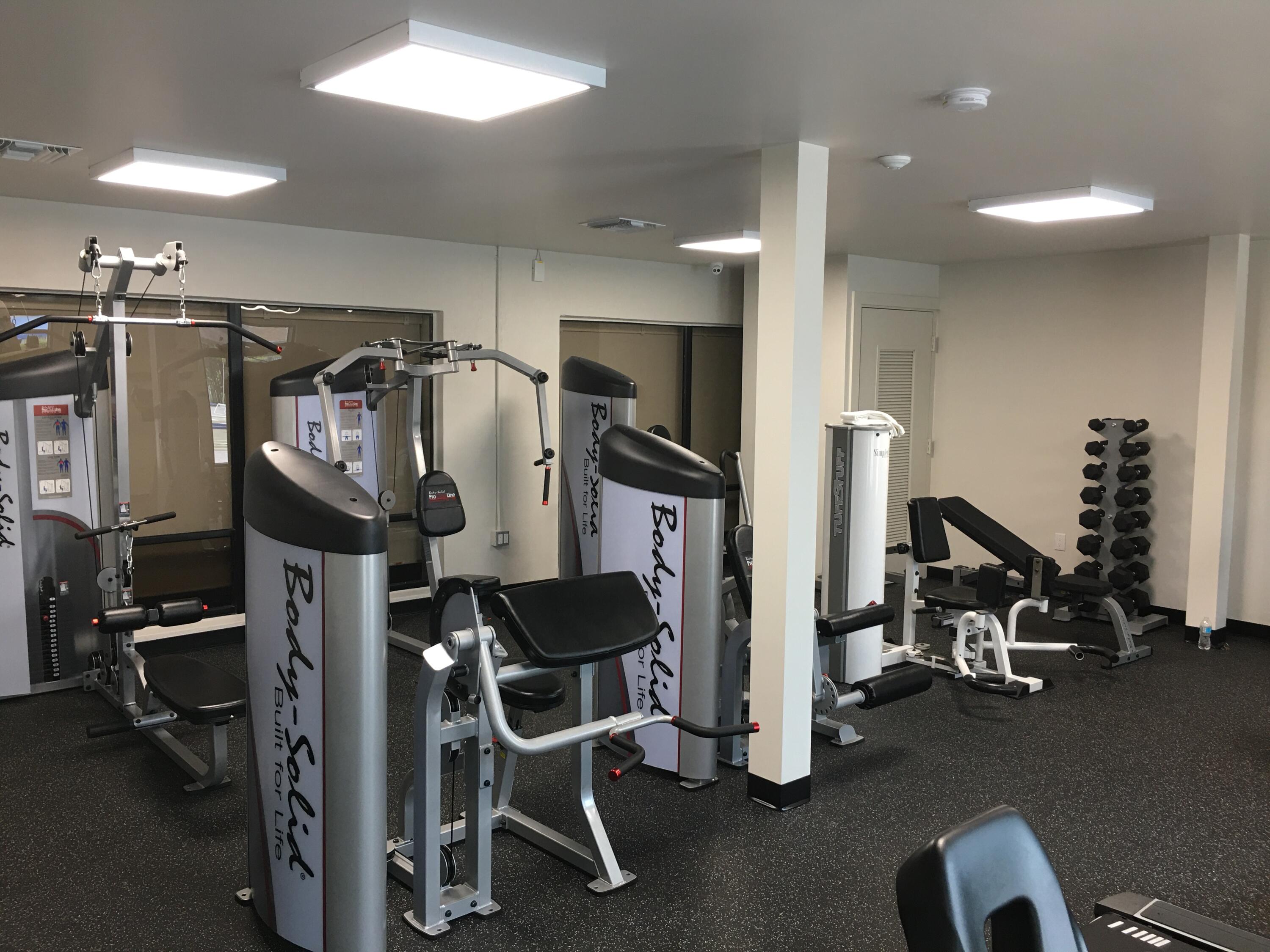 5220 Las Verdes Circle, Unit 211 Delray Beach, FL 33484 - Photo 32 of 57 a view of a room with gym equipment