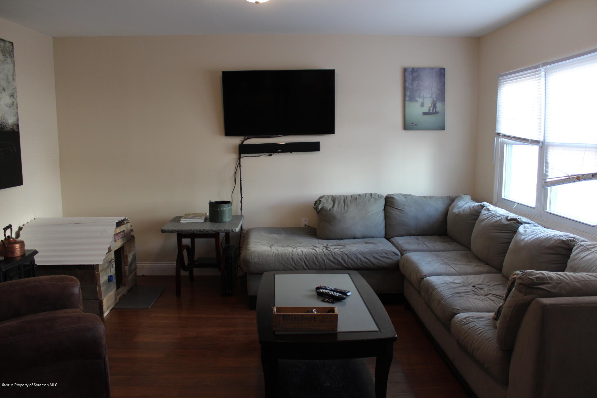18 Linden Street Luzerne, PA 18709 - Photo 12 of 21 a living room with furniture and a flat screen tv