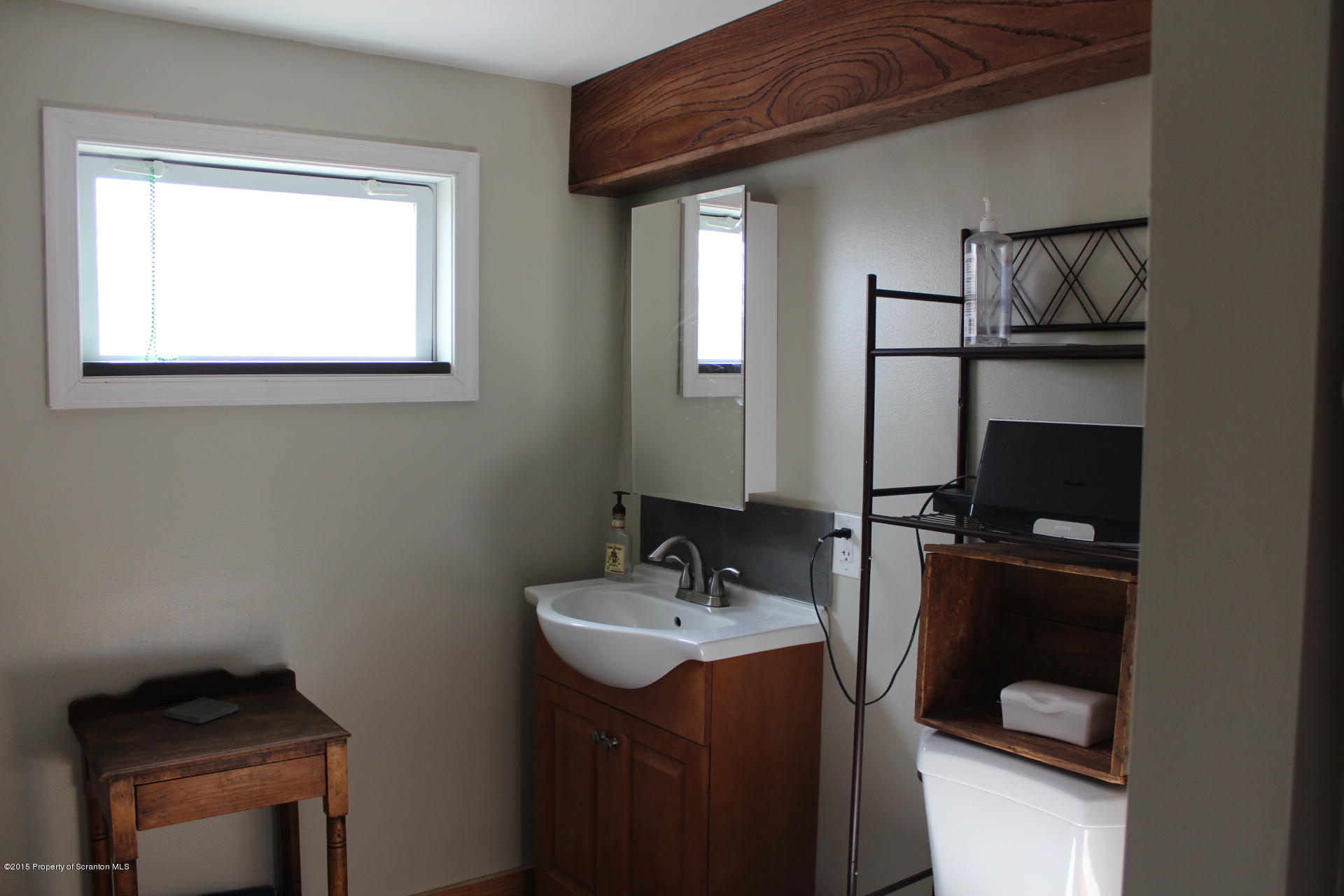 18 Linden Street Luzerne, PA 18709 - Photo 17 of 21 a bathroom with a sink and a mirror