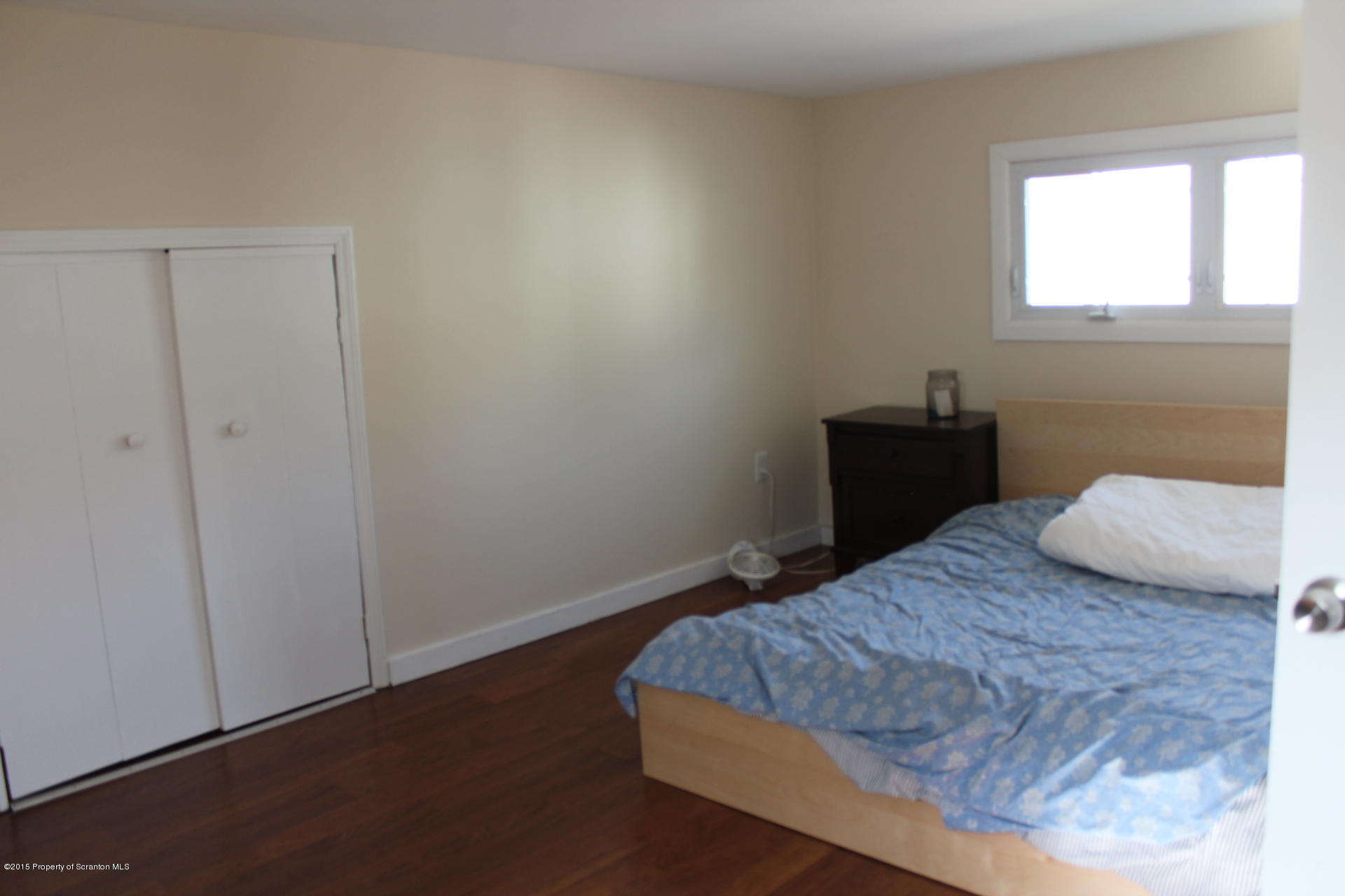 18 Linden Street Luzerne, PA 18709 - Photo 21 of 21 a bedroom with a bed and a window