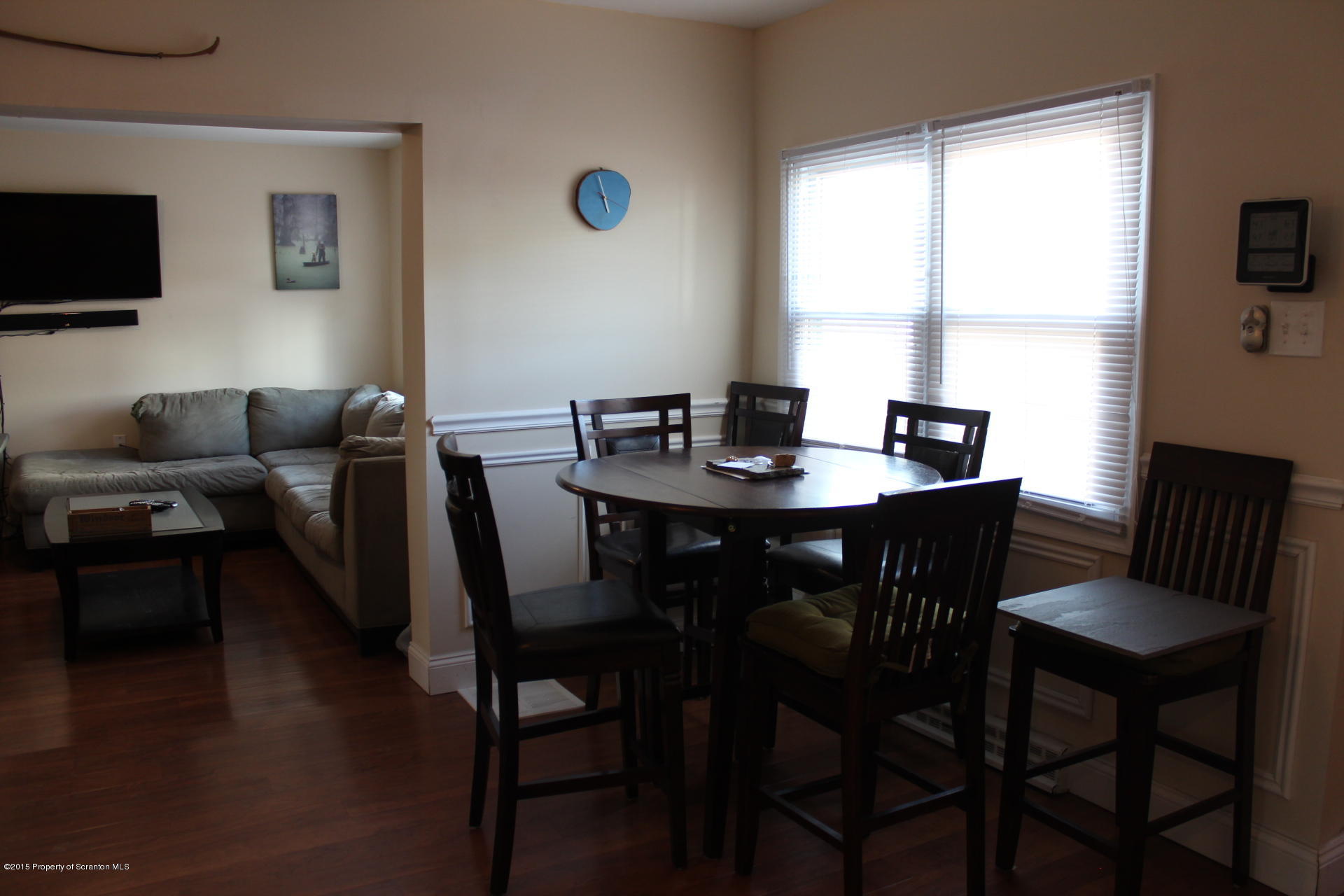 18 Linden Street Luzerne, PA 18709 - Photo 7 of 21 a view of a dining room with furniture and wooden floor