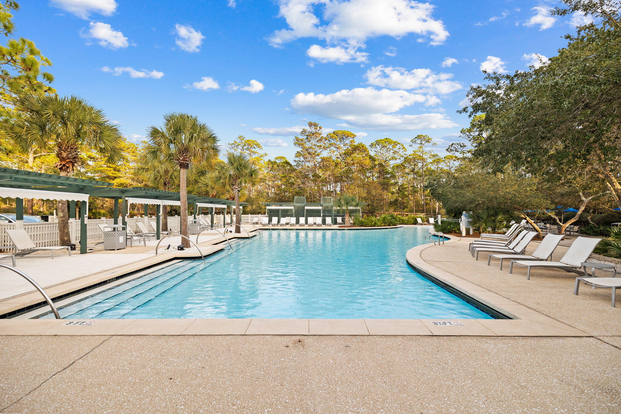 45 Plimsoll Way Santa Rosa Beach, FL 32459 - Photo 34 of 42 a view of a swimming pool with lounge chairs