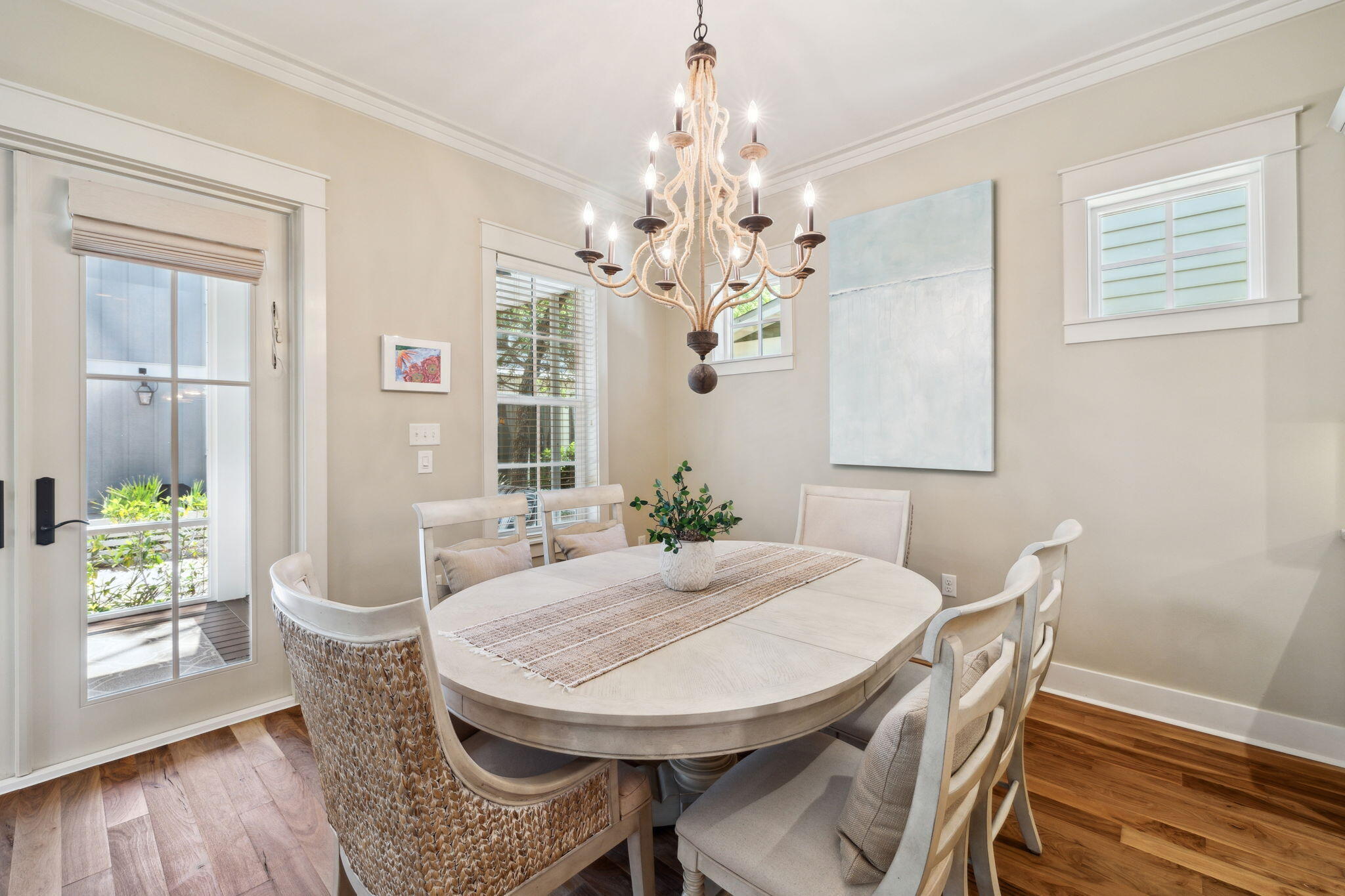 45 Plimsoll Way Santa Rosa Beach, FL 32459 - Photo 10 of 42 a view of a dining room with furniture and wooden floor