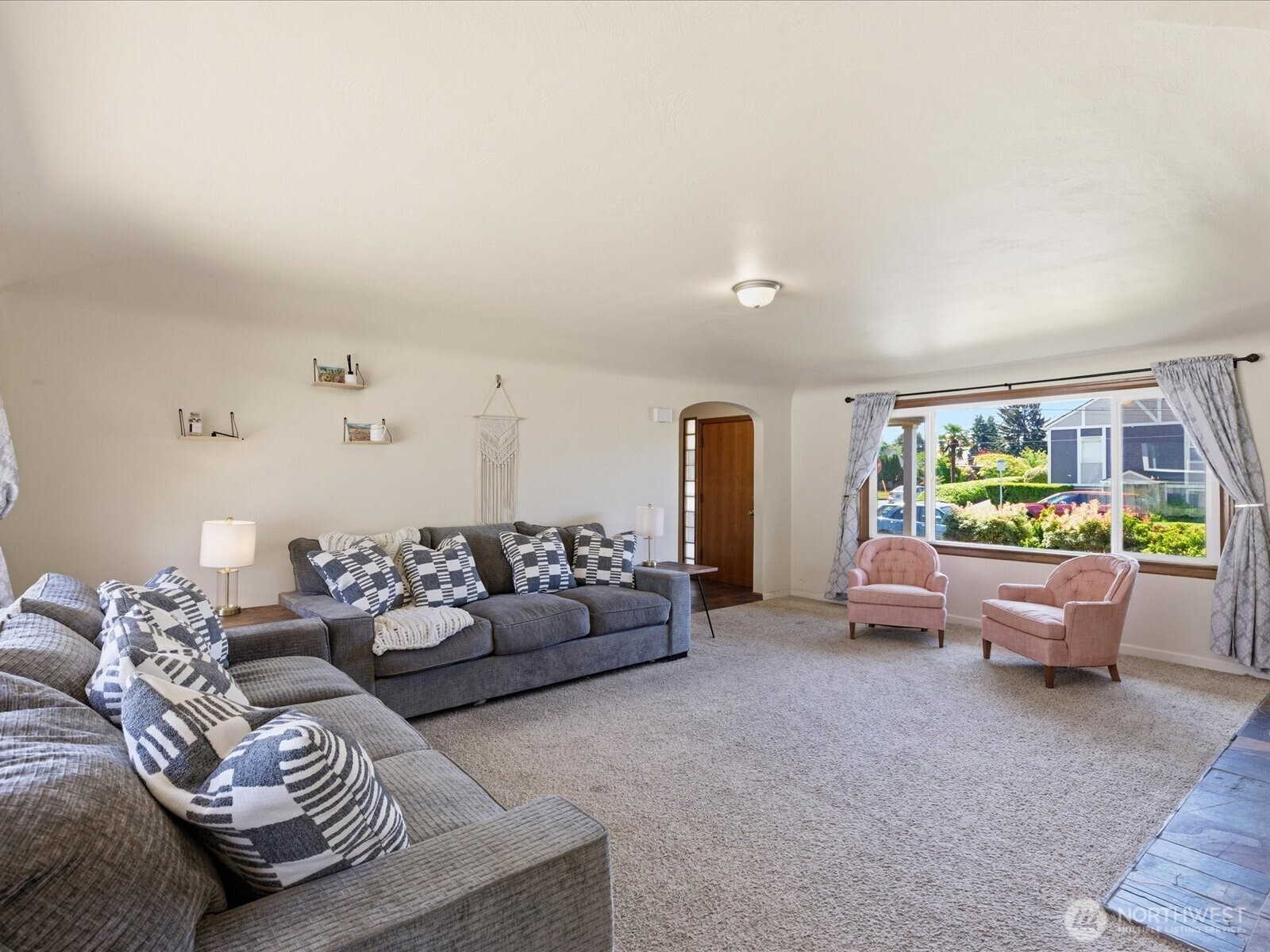 1417 Maple Street Sumner, WA 98390 - Photo 22 of 40 a living room with furniture and a wooden floor