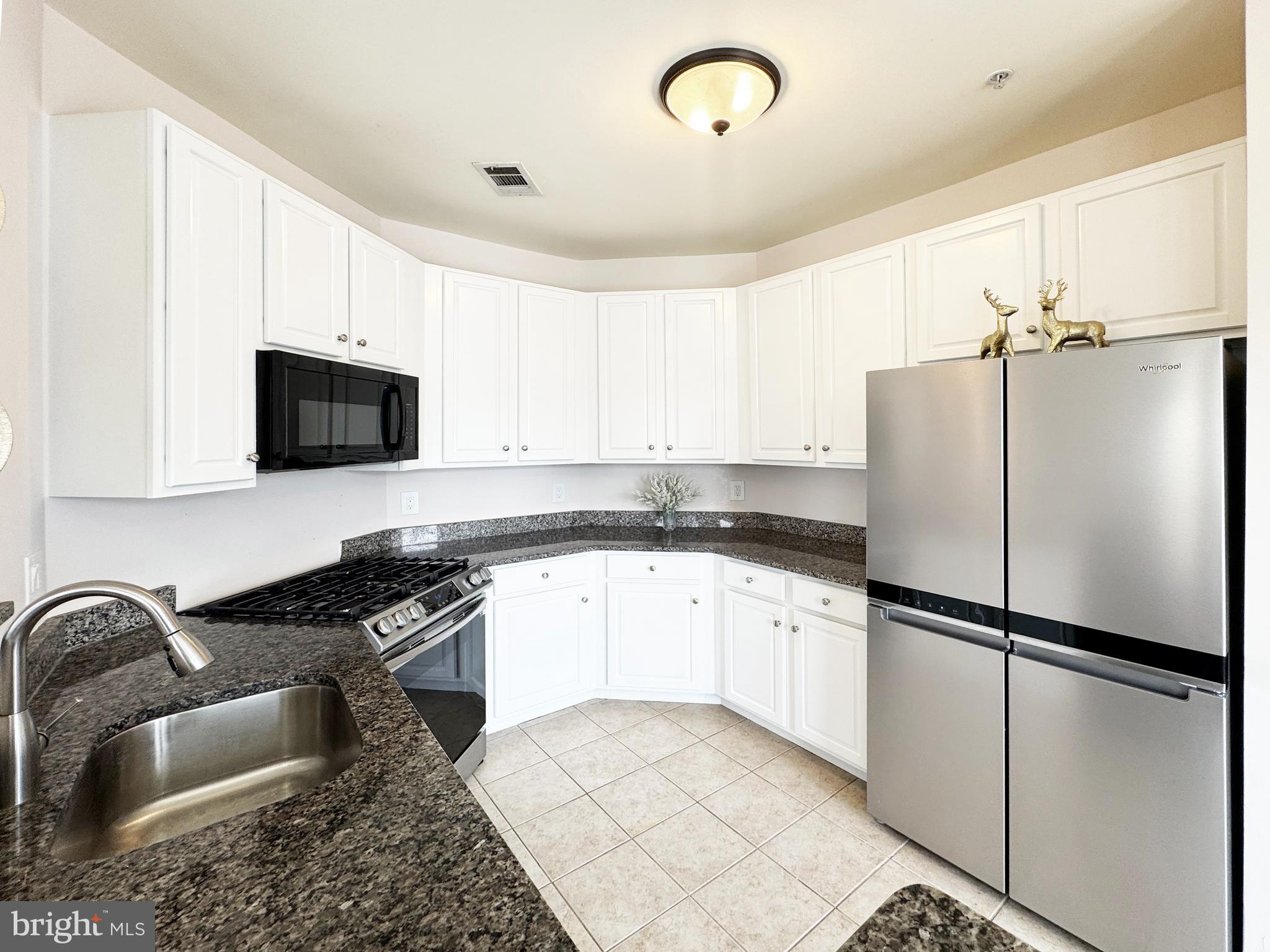 12001 Market Street, Unit 124 Reston, VA 20190 - Photo 10 of 42 Functional Kitchen