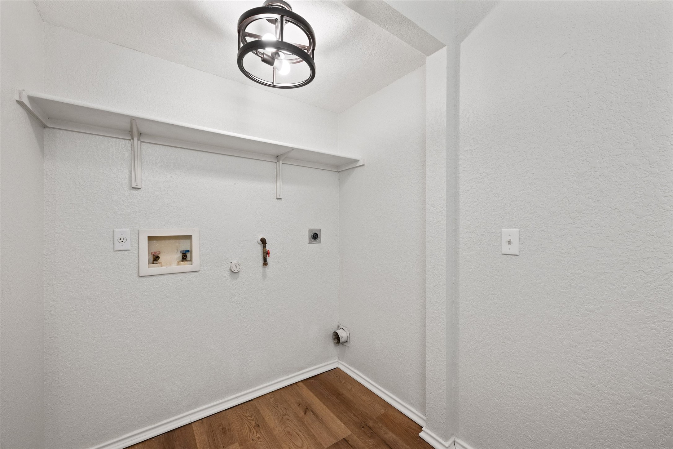 4529 Best Way Austin, TX 78725 - Photo 31 of 34 Laundry room downstairs in half bath