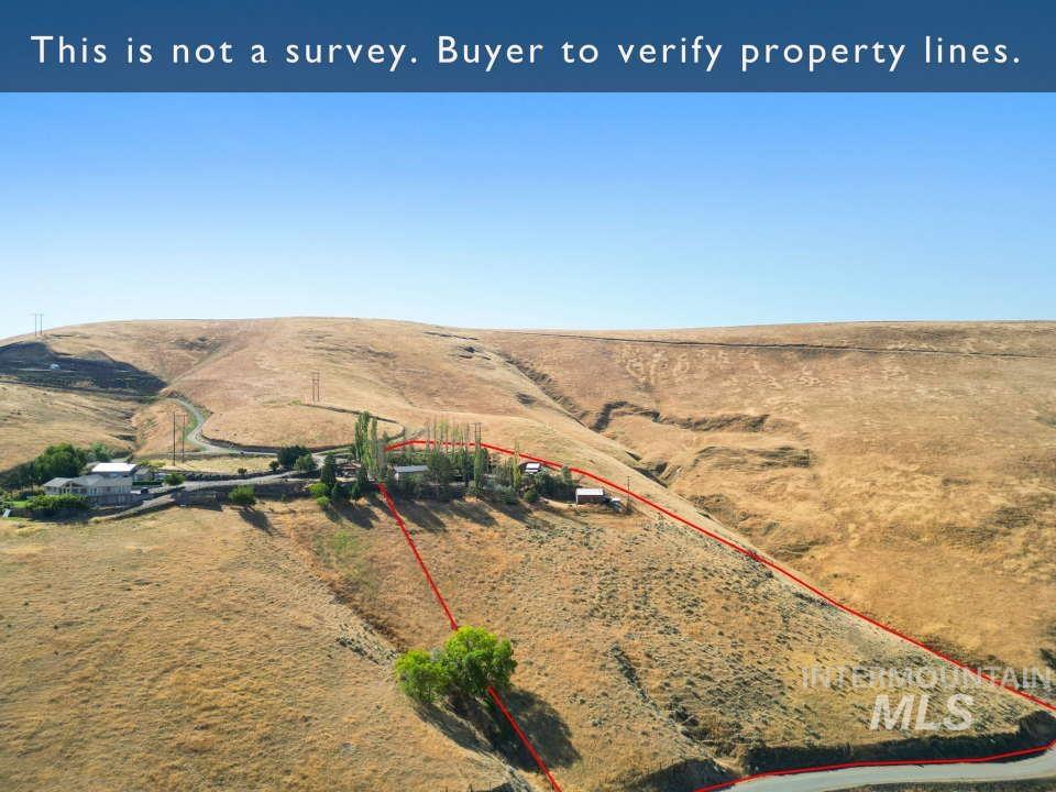 2026 Silcott Hills Road Clarkston, WA 99403 - Photo 27 of 29 Overview of rural landscape featuring property parcel outlined and a mountainous background