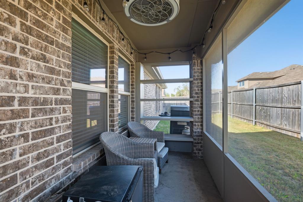 3921 Madison Lane Denton, TX 76208 - Photo 30 of 37 a balcony with chairs and table